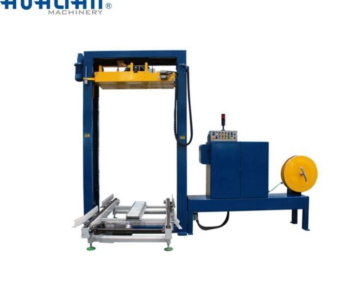 Máquina flejadora de paletas con sello superior